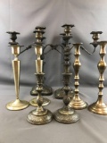 4 sets of silver plated candlesticks