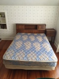 Full-size headboard with mattress and box spring