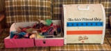 Group of vintage Barbie clothes and accessories