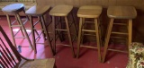 Group of five vintage wooden barstools