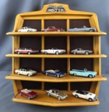 Group of 12 1:43 scale Classic Cars of the 60s with display