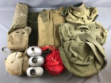 Group of Vintage Army and Boy Scout canteens and bags