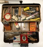 Vintage metal tackle box with gun cleaning supplies