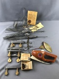 Group of 18 surf weights, hooks and more