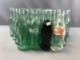 Group of Vintage small Coca Cola Bottles