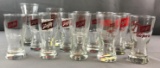 Group of 14 Schlitz beer glasses.
