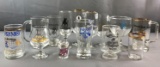 Group of 14 liquor glasses, Schlitz, patron, primo and others