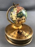 Schlitz globe paperweight