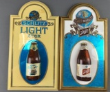 Group of 2 Schlitz signs