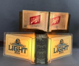 Group of 2 Schlitz lighted signs