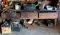 Primitive wooden workbench with tools, hardware, and more