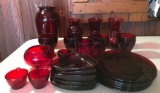 Group of 25 red glass pieces, plates, flower vases and more