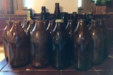 Group of 29 vintage brown glass bottles