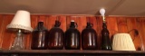 Shelf lot of vintage Brown glass jugs and more