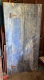 Primitive blue wooden cabinet with contents