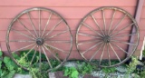 Group of to antique wooden wagon wheels