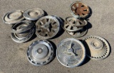 Group of vintage hubcaps