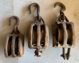 Group of three primitive Wood Pulleys