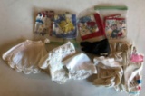 Group of vintage handkerchiefs gloves and collars