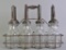 Vintage Jay B Rhodes Glass Motor Oil Bottle Set with Rhodes Spouts and Carrier