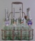 Group of 7 Vintage Standard Oil Co. Indiana Green Glass Motor Oil Bottles with Spouts and Carrier