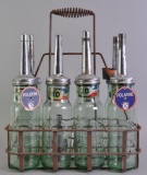 Group of 7 Vintage Standard Oil Co. Indiana Green Glass Motor Oil Bottles with Spouts and Carrier