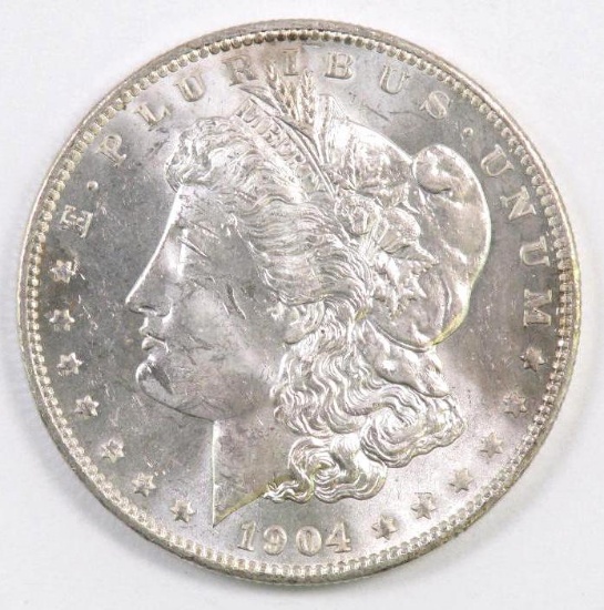 1904 O Morgan Silver Dollar.