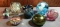 Group of 8 glass paperweights including murano glass