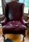 Burgundy leather wing back chair