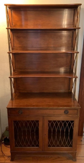 Vintage wooden shelving with ornate pulls