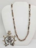 Large Pendant and Chain-strung Silver Bead Necklace