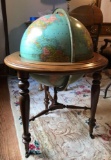 Vintage globe in wood stand