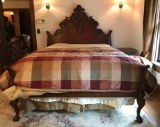 Ornate mahogany queen sized bed