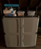 Plastic cabinet with office supplies