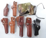 Group of 7 Gun Holsters and Rifle Sleeve