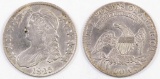 1825 Capped Bust Silver Half Dollar.