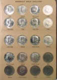 Group of (139) Kennedy Half Dollars in Dansco Album 8166.