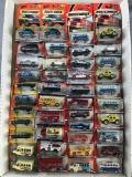 Group of 42 Matchbox Die-Cast Vehicles in Original Packaging