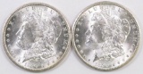Group of (2) 1899 O Morgan Silver Dollars.