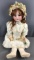 Antique Kammer and Reinhardt bisque redhead doll with brown eyes