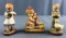 Group of 3 ANRI wood figurines including yearly check up in original boxes