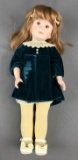 Yolanda Bello porcelain doll in green velvet dress