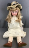 Antique SFBJ Bisque head blonde doll with brown eyes