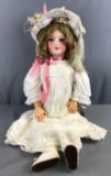 Antique Unis France doll with Original wig and blue eyes