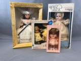 Group of four vintage dolls in original packaging including vogue Ginny and little belle