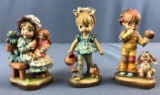 Group of 3 ANRI wood figurines including cherish and sweet treat in original boxes