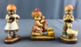 Group of 3 ANRI wood figurines including yearly check up in original boxes