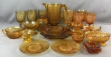 Group of 20+ pieces amber pressed glass