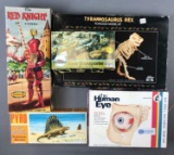 Group of five puzzle and model kits