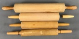 Group of four wooden rolling pins
